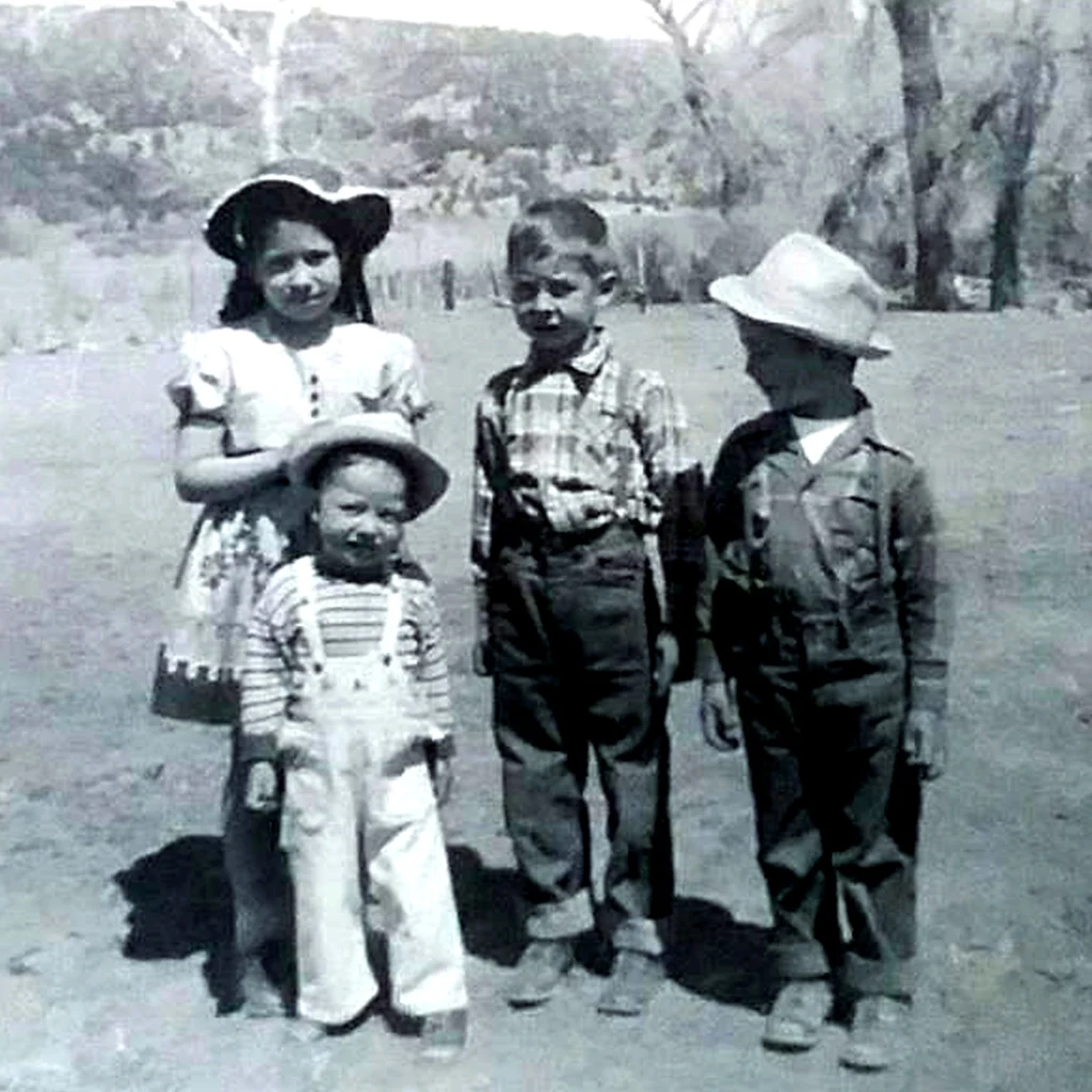 Gallegos family children circa 1956 near Arboles, Colorado. Town now is submerged beneath Navajo Lake.