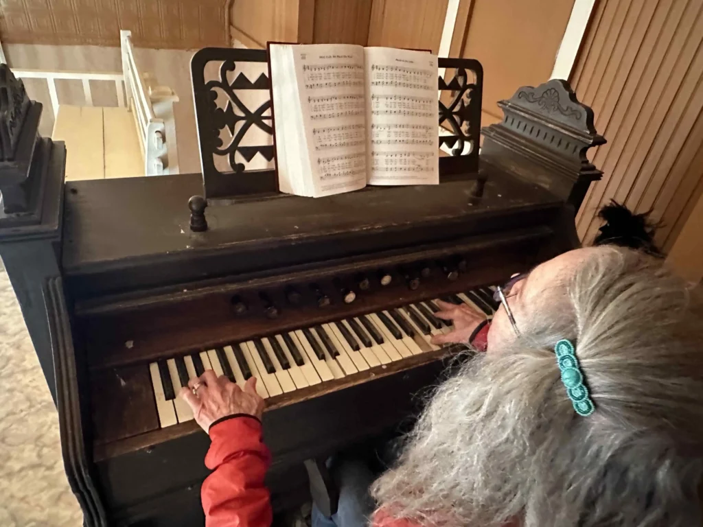 The antique pump organ in the Tiffany Church is estimated to be nearly 100 years old.